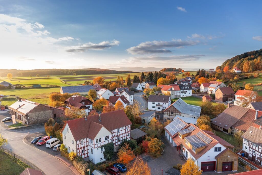 Economic Impact on Real Estate: How Do Economic Factors Influence Property Values? aerial view of homes