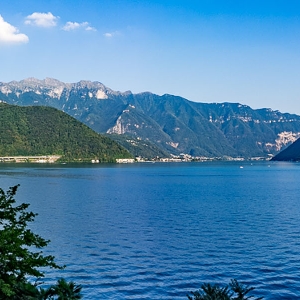 Apartamento com jardim em Lago de Lugano></noscript>
                                                        <span class=